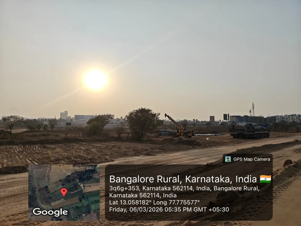 Featured Image of Sobha One World Site Progress March 2026 - sunset over the 48-acre parcel with precast pipes staged on-site, GPS-stamped Amanidoddakere