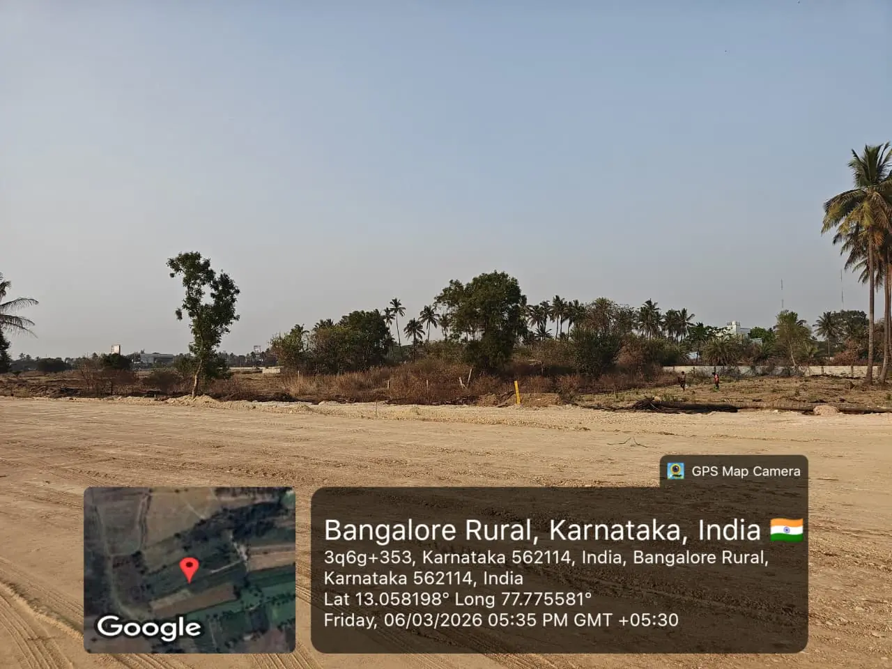 Featured Image of Sobha One World Site Progress March 2026 - graded site with workers performing boundary demarcation, GPS-stamped Amanidoddakere